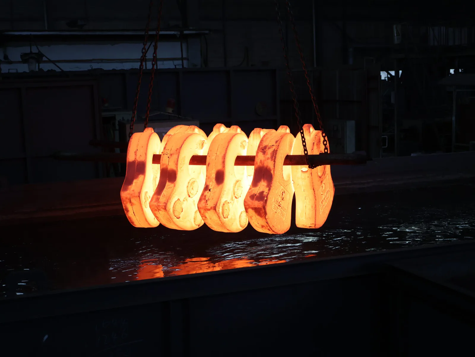 High-temperature alloy casting being quenched after pouring